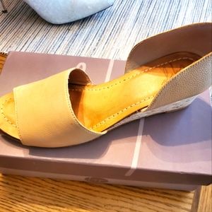 Gently worn fine genuine leather wedge sandals